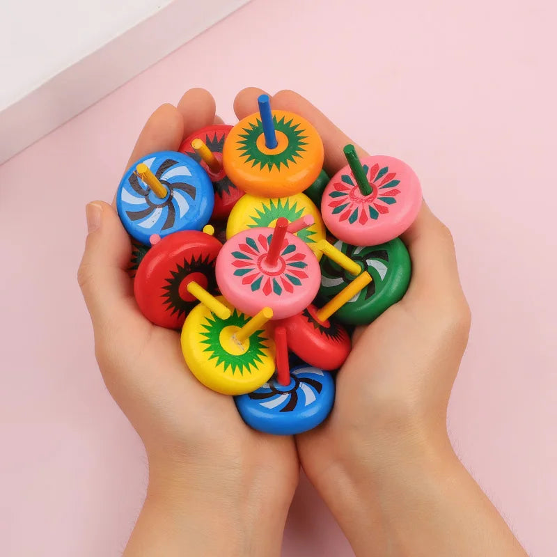 12/24pcs mini wooden spinning tops – fun finger toys for kids’ party favors.