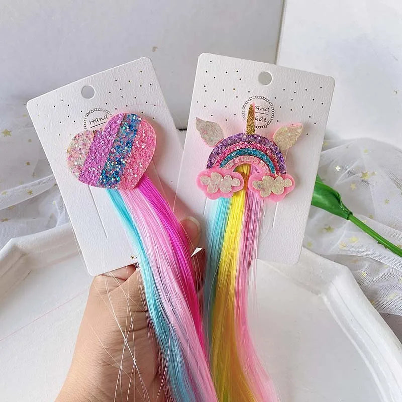 Unicorn colorful hair clips – fun rainbow party favors and accessories for kids.