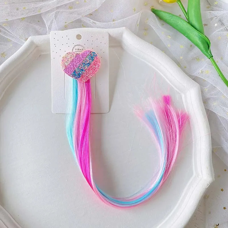 Unicorn colorful hair clips – fun rainbow party favors and accessories for kids.
