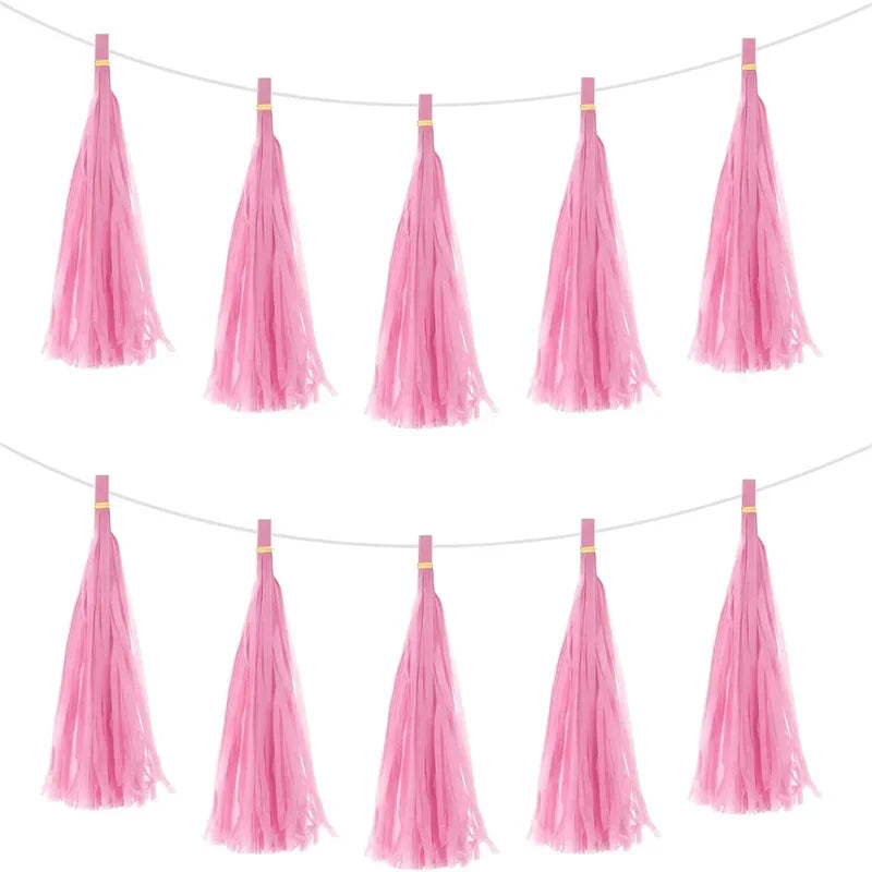 Pastel macaron balloons with paper tassel garland for parties and celebrations.