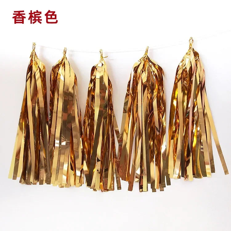 Pastel macaron balloons with paper tassel garland for parties and celebrations.