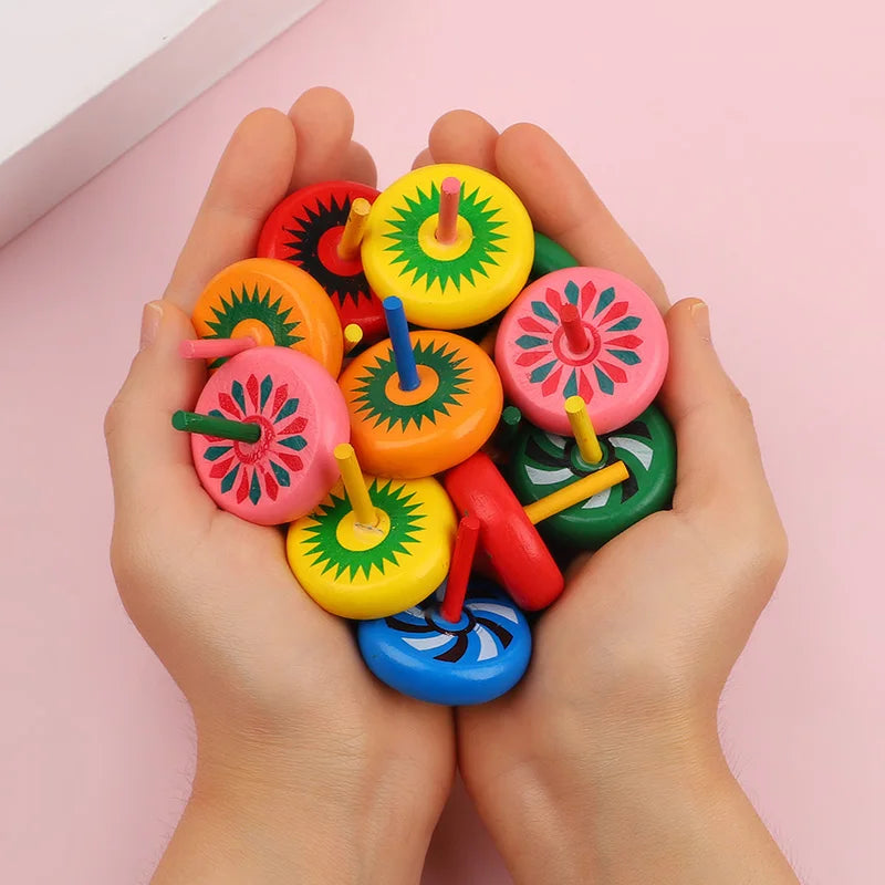 12/24pcs mini wooden spinning tops – fun finger toys for kids’ party favors.