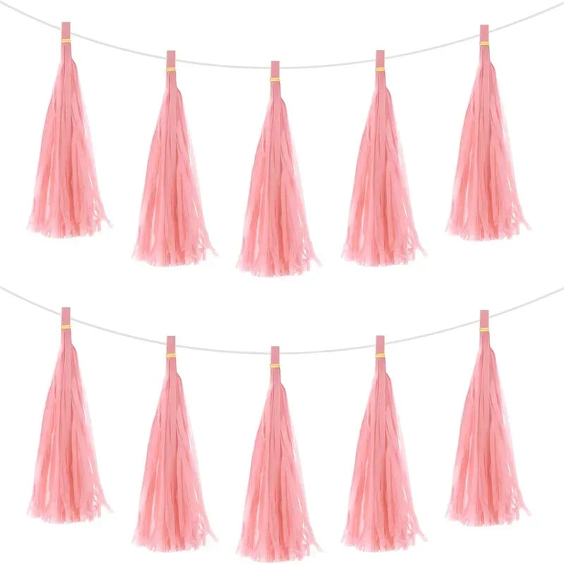 Pastel macaron balloons with paper tassel garland for parties and celebrations.