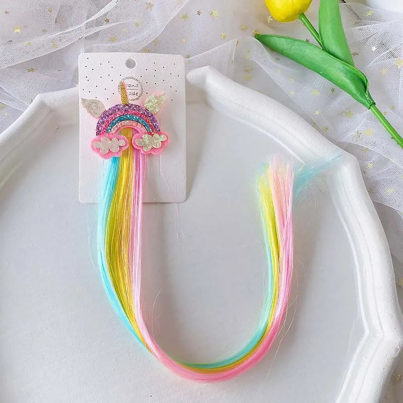 Unicorn colorful hair clips – fun rainbow party favors and accessories for kids.