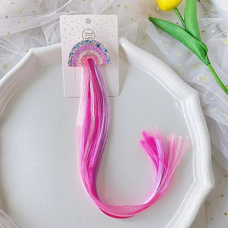 Unicorn colorful hair clips – fun rainbow party favors and accessories for kids.