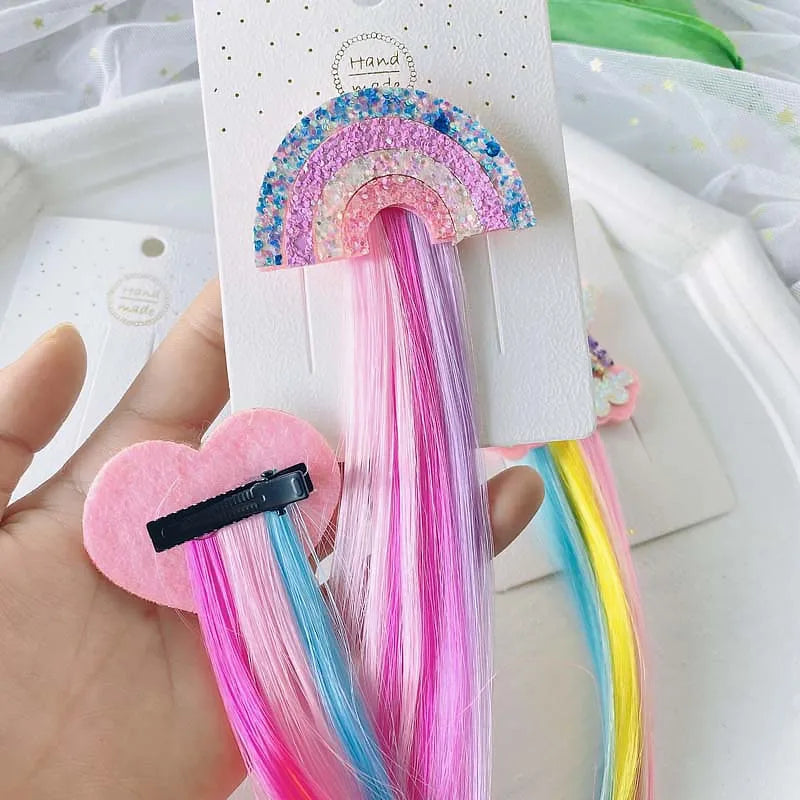 Unicorn colorful hair clips – fun rainbow party favors and accessories for kids.