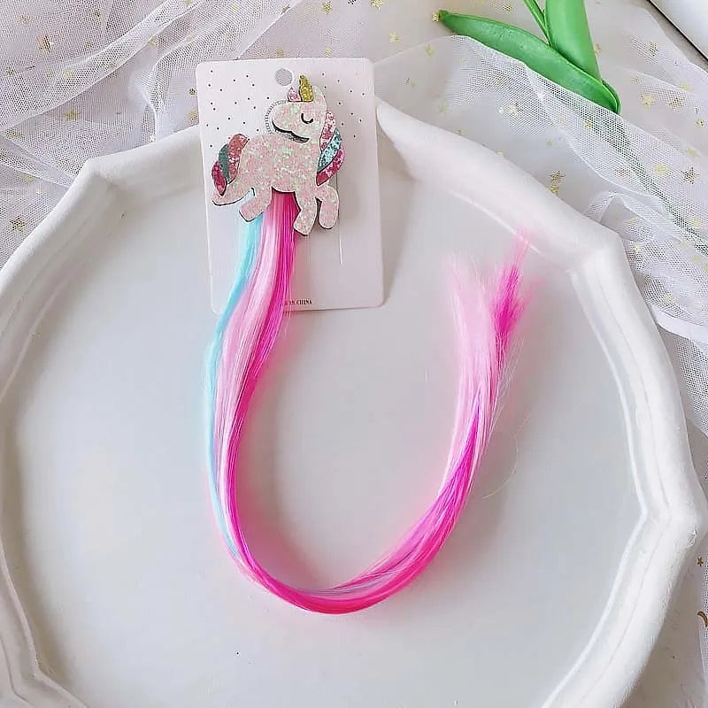 Unicorn colorful hair clips – fun rainbow party favors and accessories for kids.
