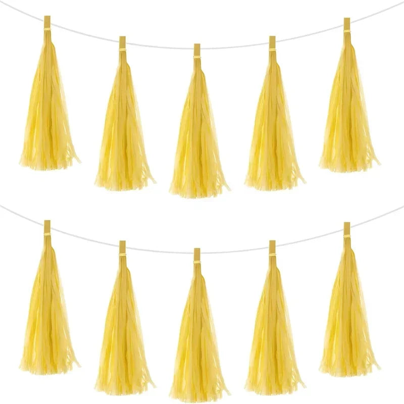 Pastel macaron balloons with paper tassel garland for parties and celebrations.